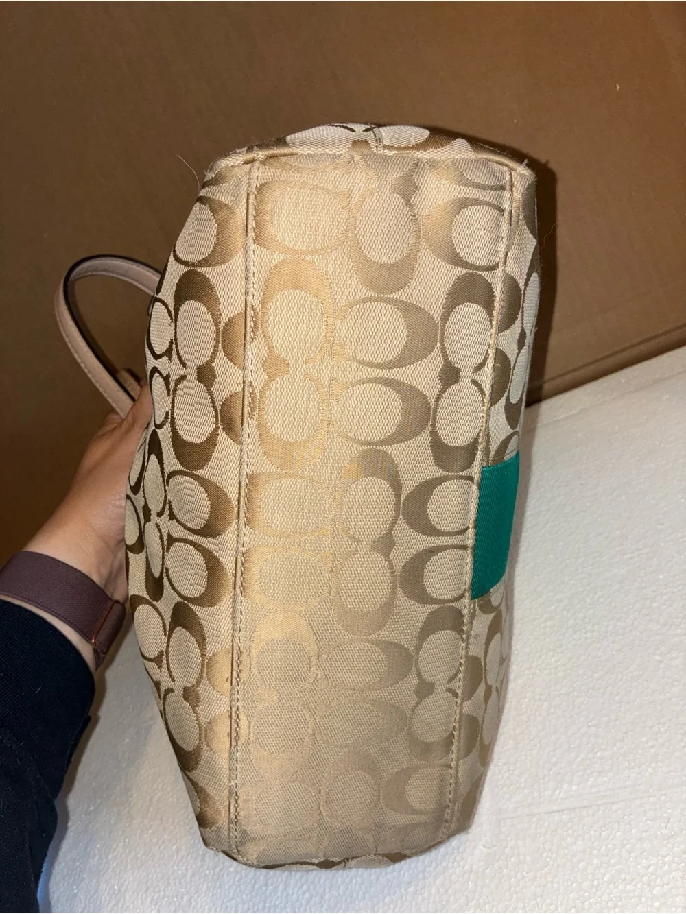 COACH Beige Signature Tote with Teal Center Stripe.